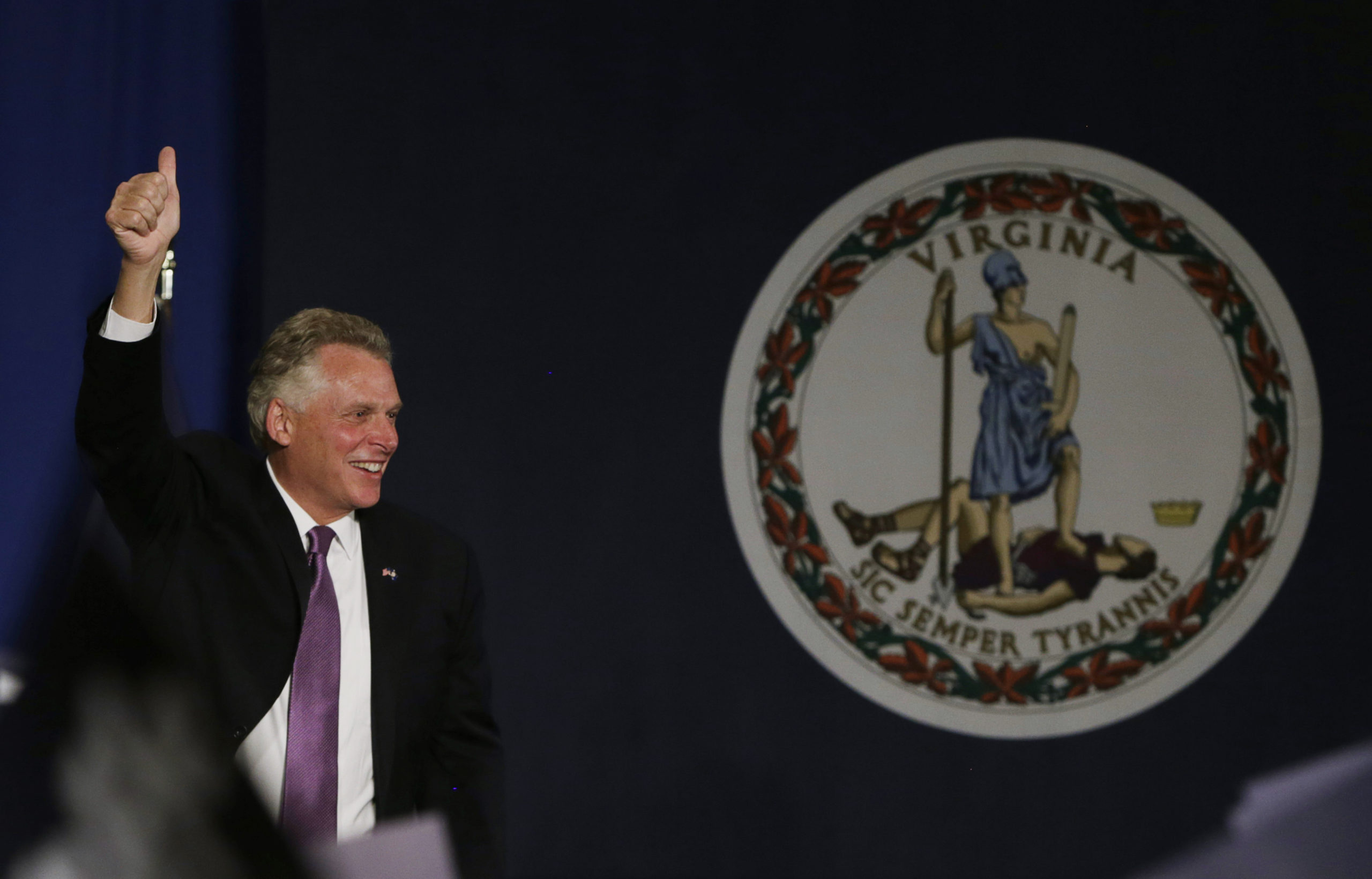 Virginia Democratic governor-elect Terry McAuliffe speaks at his election night victory rally in Tyson's Corner, Virginia November 5, 2013. McAuliffe defeated Republican candidate Ken Cuccinelli in today's governor's election in Virginia. REUTERS/Gary Cameron    (UNITED STATES - Tags: POLITICS ELECTIONS) - RTX151T0